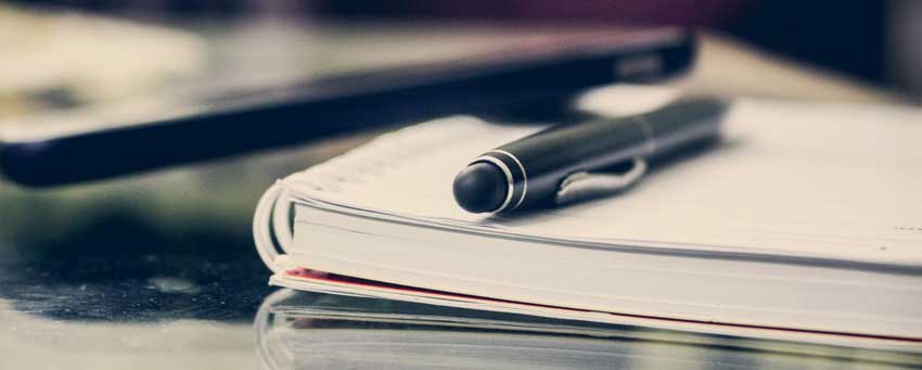 Füller auf Notizblock